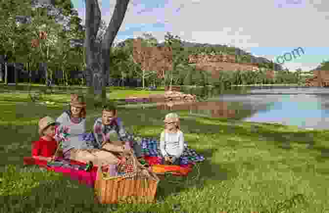 A Family Enjoying A Picnic In A Sydney Park Things To Do In Sydney For Free