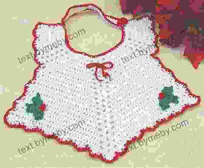 Intricate Details Of Crochet Pattern Christmas Bib Pa221 Close Up Of The Knitted Christmas Motifs And Vibrant Colors. Crochet Pattern Christmas Bib PA221 R